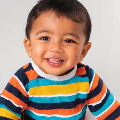 Firefly-a-baby-boy-smiling-1-years-old-Indonesian-close-up-photo-isolated-over-the-white-backgro-1